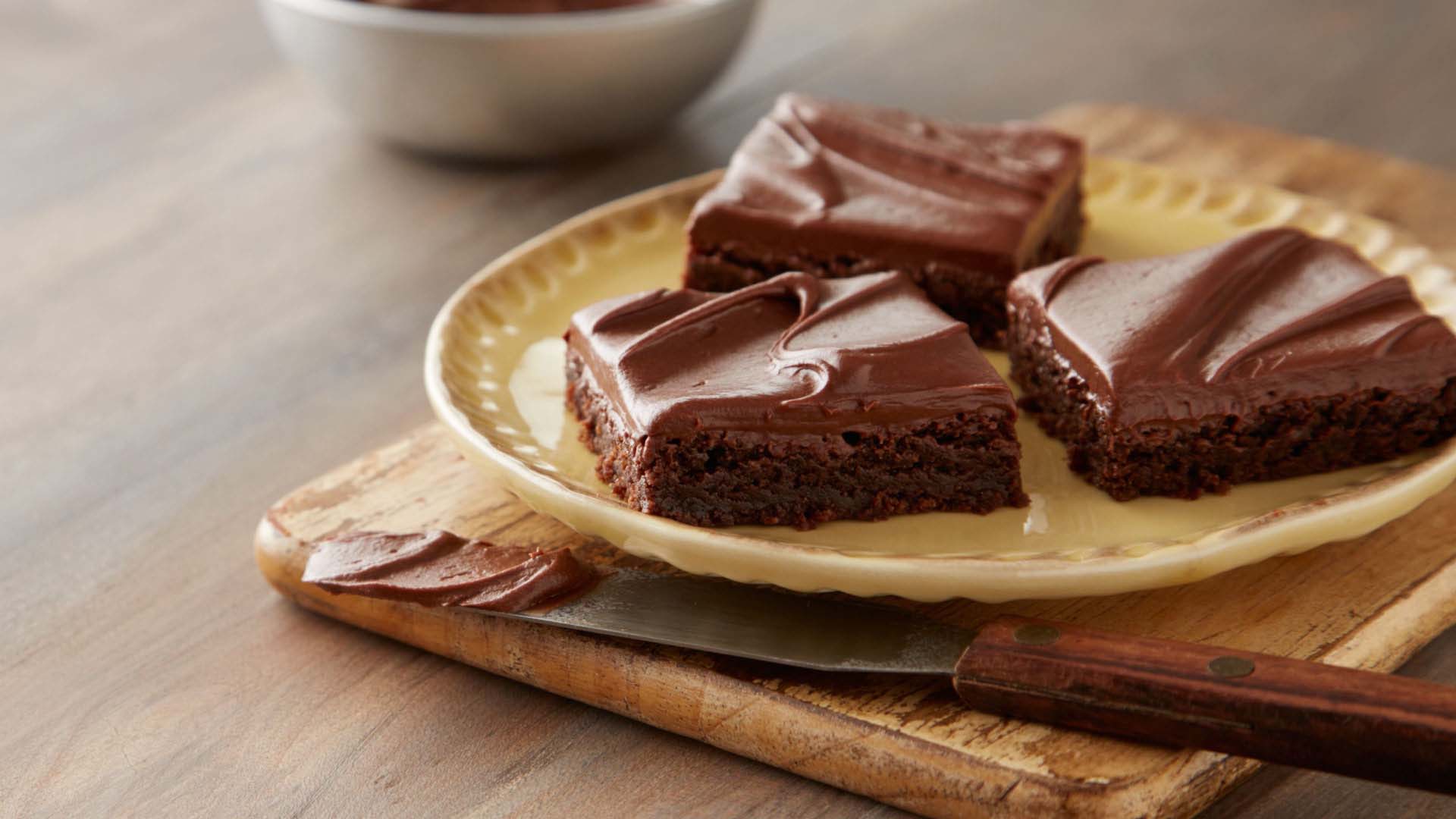 plate of iced brownie squares